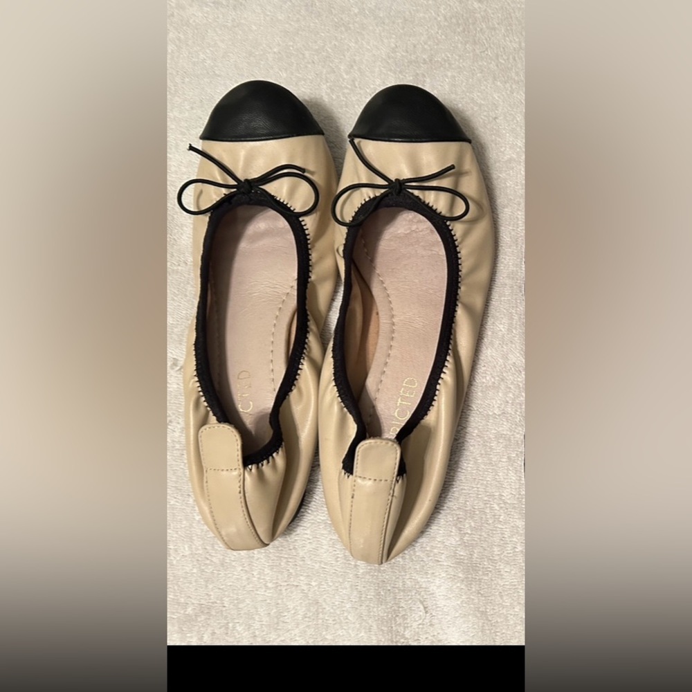 Women’s Restricted brand size 7 beige and black flats